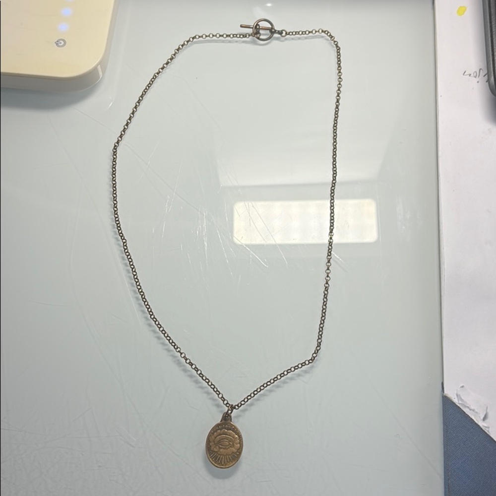 Eye of God pendant rolo chain necklace